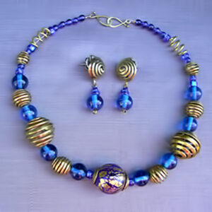 Brass forged roll-up beads w/ cobalt blue beads